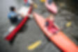 Reheaded girl on kayak